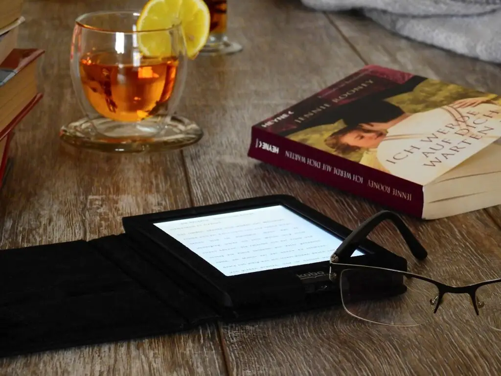 a book, read, literature, to learn, text, writing, side, glasses, tea, drink, glass, reader, e-reader, technology, digital, kobo, kindle, paper, kindle, kindle, kindle, kindle, kindle