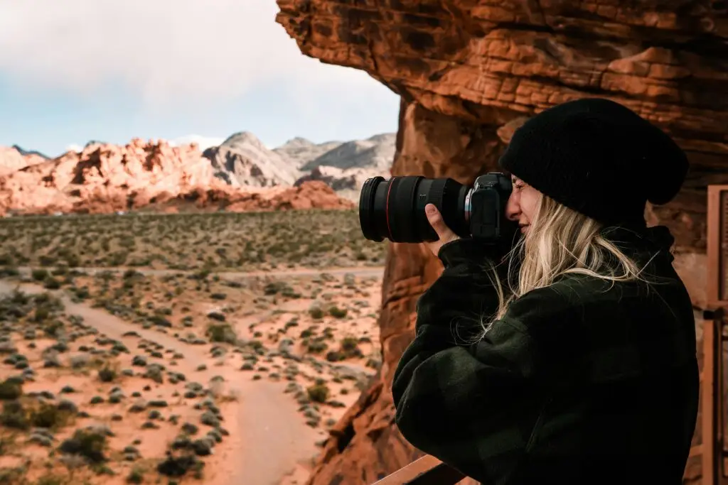 A photographer focuses on capturing the stunning desert landscape in Moapa Valley, Nevada.